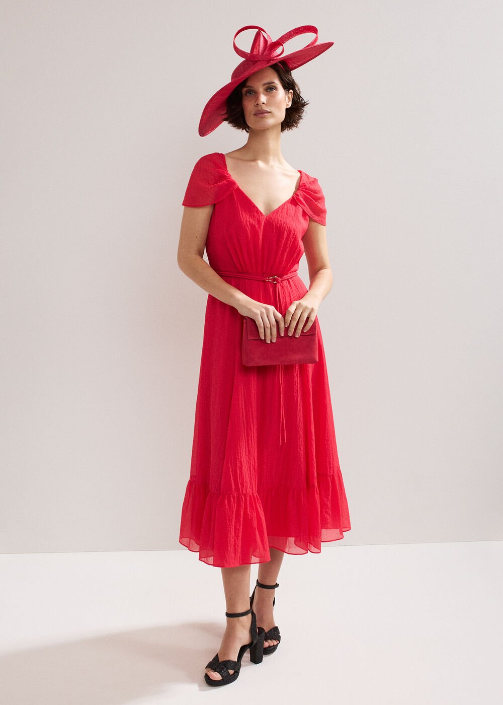 Twist Back Statement Fascinator Coral